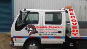 logo on a recovery truck